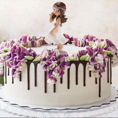 Torta comunione con cioccolato colato e fiori 3d in panna